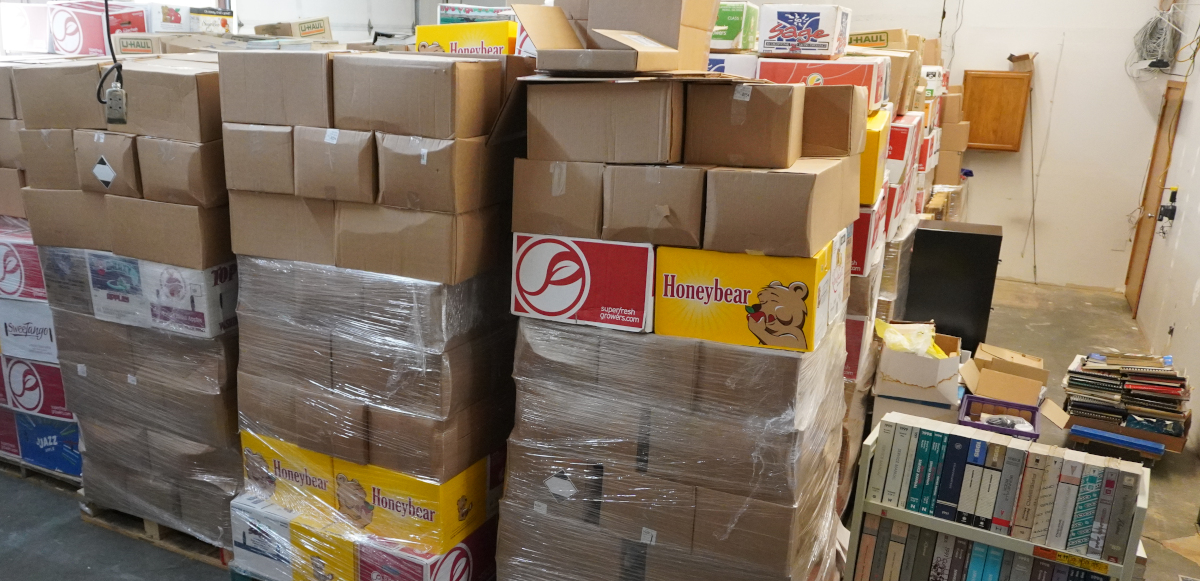 Photo of boxes of books in the Ethyl's Garage warehouse.